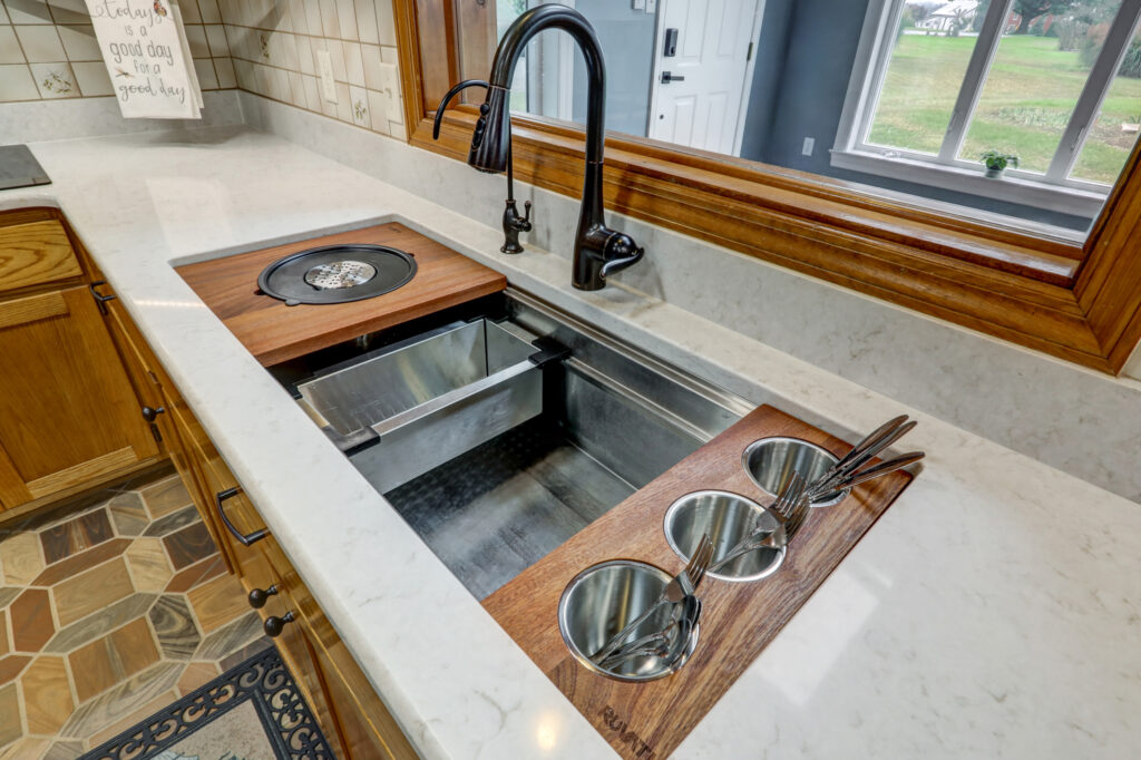 This is a wooden kitchen remodel that includes a kitchen expansion, kitchen island replacement, and tilework.
