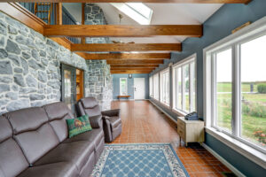 This home includes many interior renovations done with natural woodwork and stone.