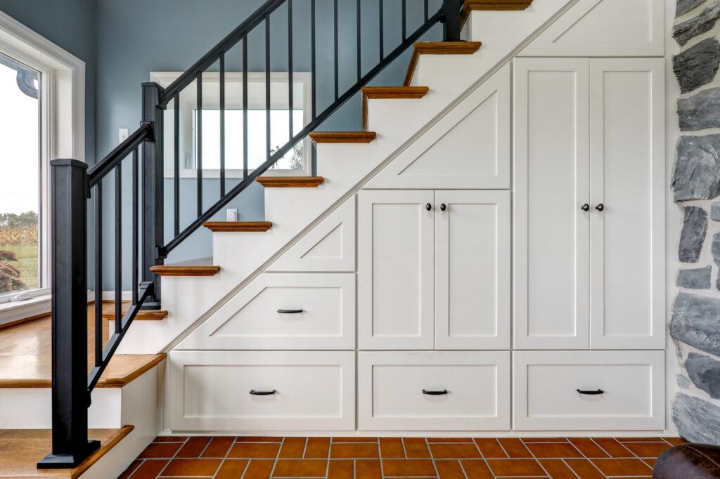 This is a staircase with storage designed underneath to improve organization in the home.